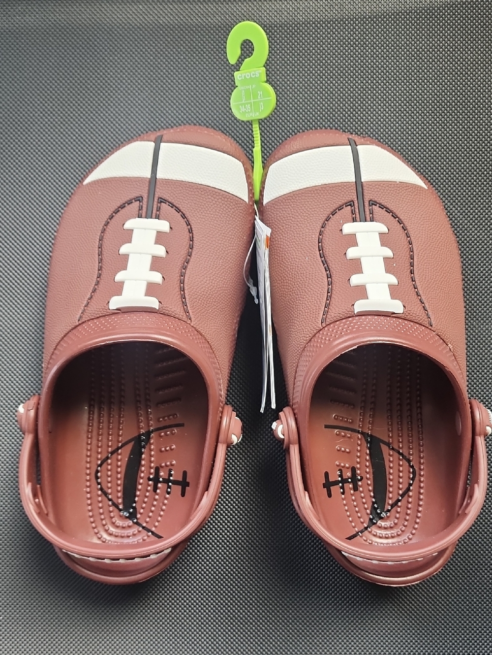 CROCS Kids Football Graphic Clog Sandals in Brown and White